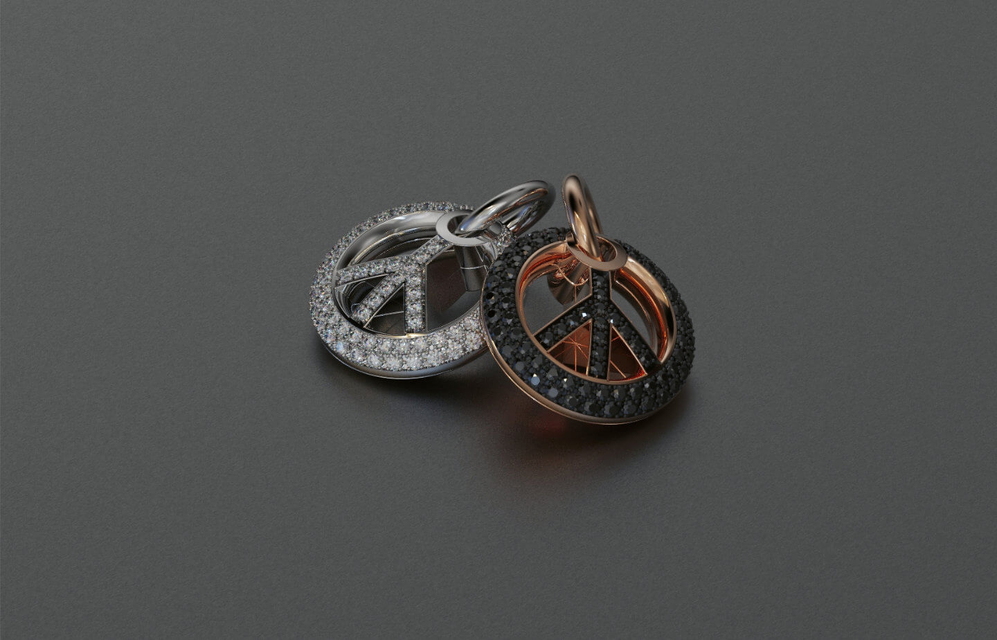 Anhänger Peace aus 750er Weißgold, mit Brillanten und 750er Roségold mit schwarzen Brillanten – stilvoller Kontrastlook – edler Designschmuck vom Juwelier in Köln